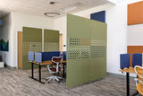 Modern office setup with green partition walls and office furniture.
