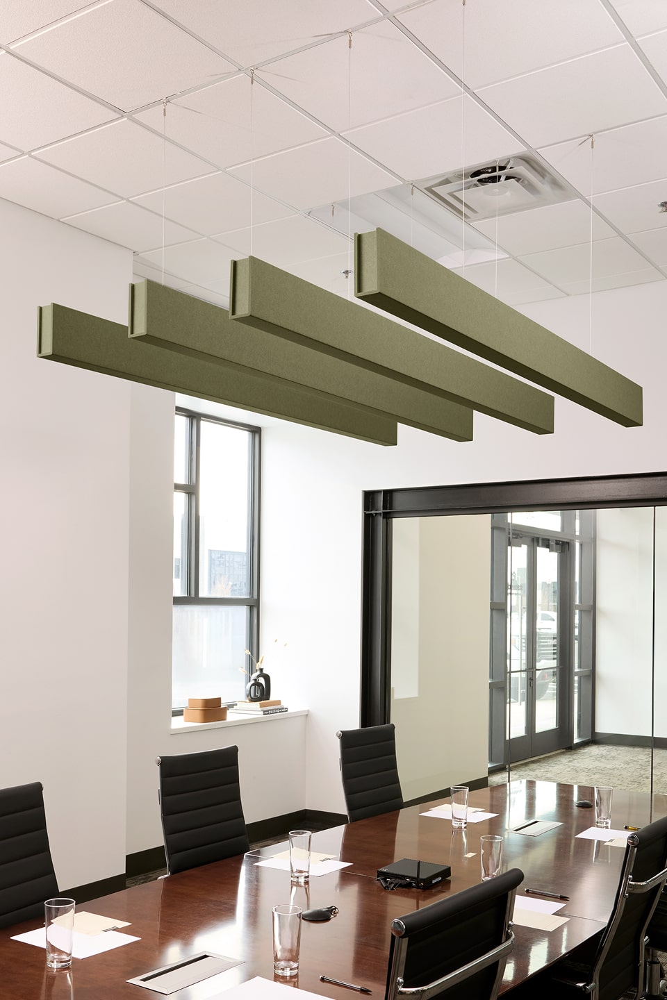 PET felt suspended acoustic beam in Olive by Felt Right absorbs unwanted noise and looks great in any setting. Available in four or eight foot lengths. Clips into ACT grid or drills into drywall ceiling.