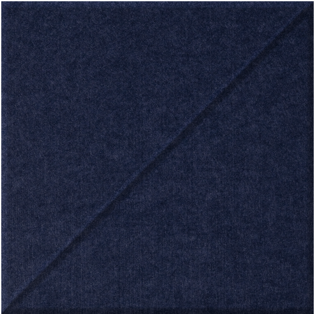 Dark blue tile with diagonal slash pattern dividing the surface into two sections.