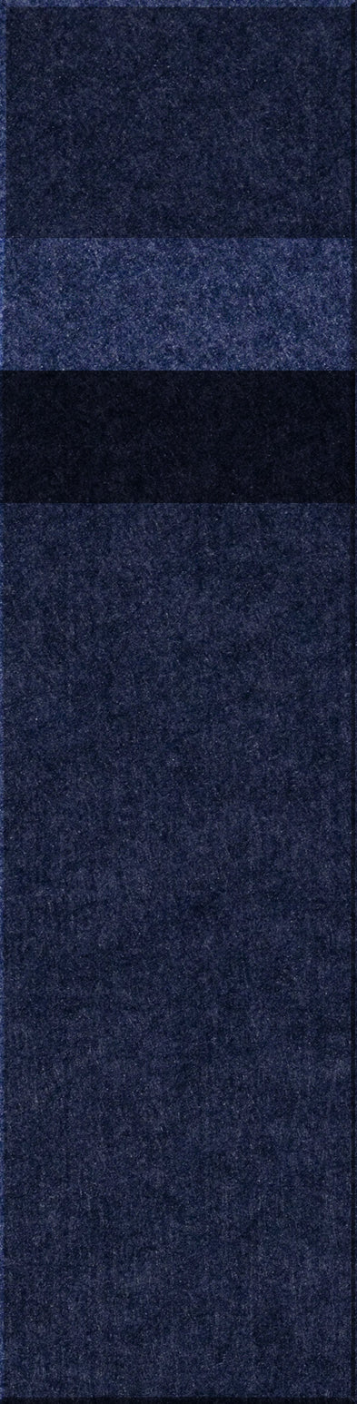 Four rectangular tiles in dark blue and black with textured speckled surfaces arranged vertically.