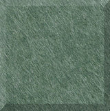 Green textured tile surface with diagonal linear pattern and matte finish.