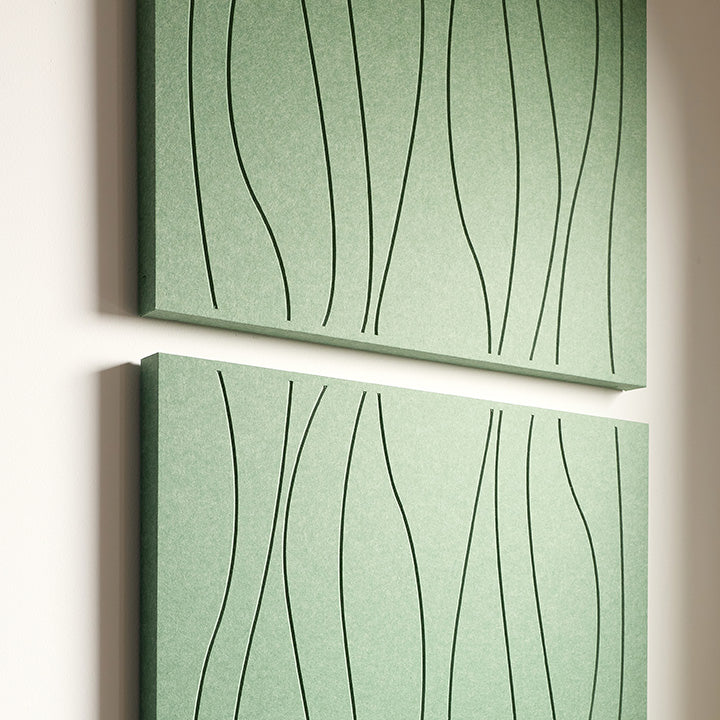 Two rectangular acoustic wall art panels in a muted sage green color, each decorated with thin engraved wavy vertical lines, displayed against a light neutral wall.