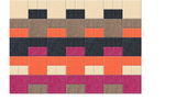 Geometric quilt pattern with repeating blocks in cream, gray, coral, magenta, and navy blue.