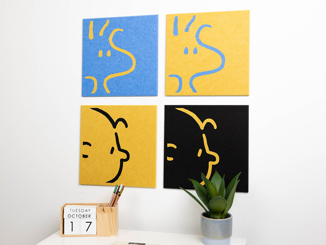 Colorful felt wall art design of popular cartoon characters in a midcentury modern living room