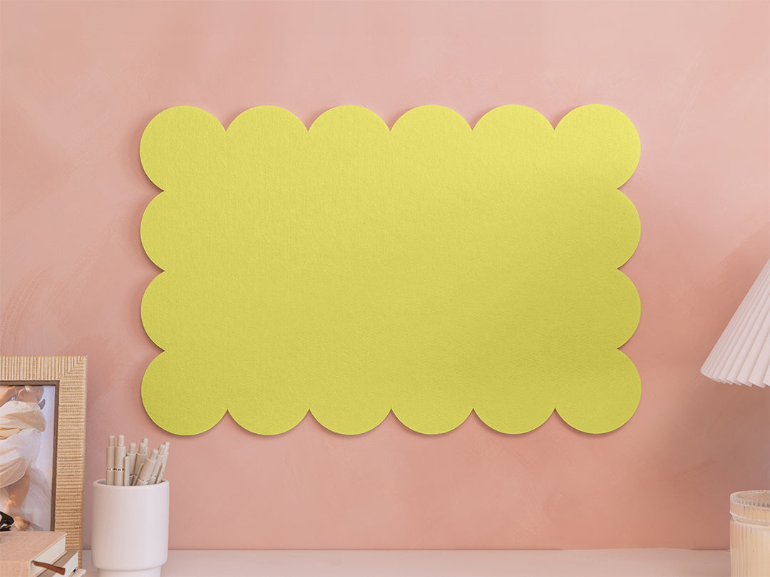 Decorative lime green wall panel on a pink wall