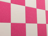 Checkered pattern with pink and white squares