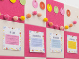 Educational posters on a wall with colorful decorations