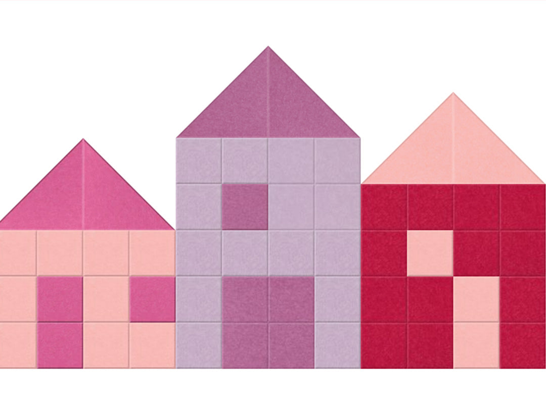 Three colorful geometric house-shaped blocks on a white background