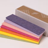 Colorful palette of felt samples with cardboard box
