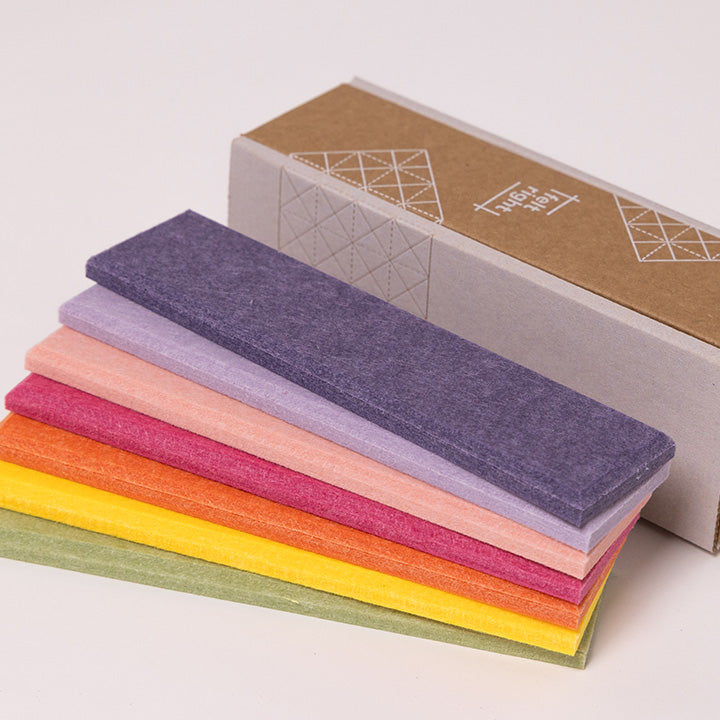 Colorful palette of felt samples with cardboard box