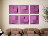Six purple square tiles with layered geometric cutouts and shadows arranged in a grid on a wall above a tan sofa.
