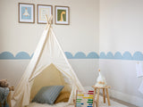 Powder Blue and Latte wainscoting design in a kids playroom area