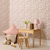 Beige tile with repeating pattern of delicate flowering branches in pink, burgundy, and olive tones.