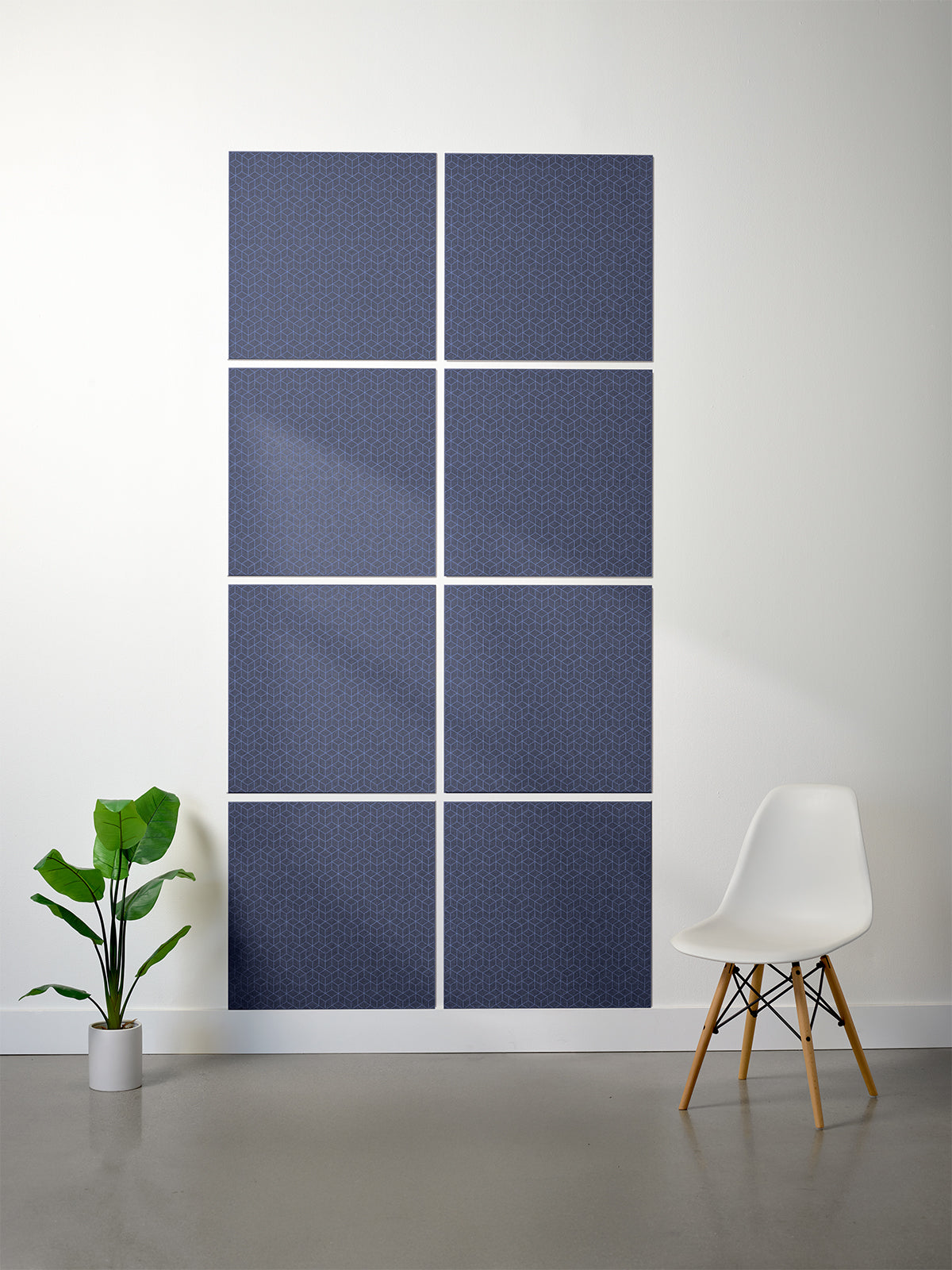 Geo printed patterned tiles on white wall in indigo