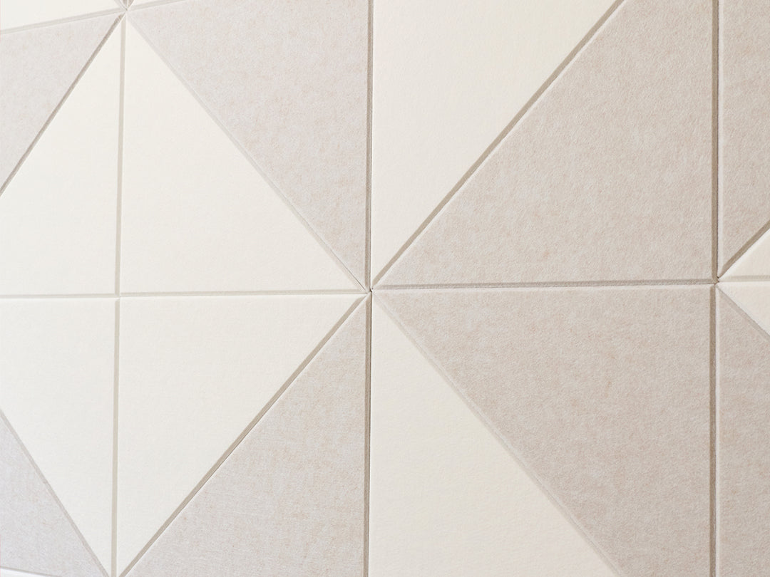 Geometric tile pattern with white and beige tiles