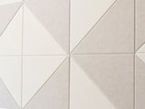Geometric tile pattern with white and beige tiles