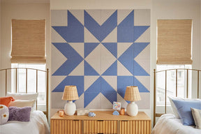 Felt Right Quilting Star quilt design wall in light purple and grey displayed in a bedroom