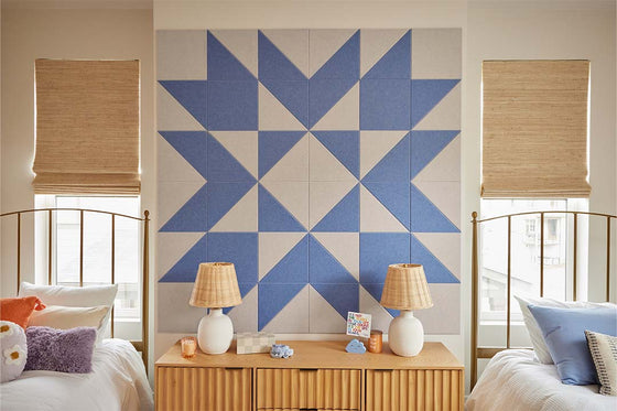 Felt Right Quilting Star quilt design wall in light purple and grey displayed in a bedroom