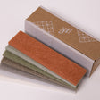 Fall colored felt samples by cardboard box