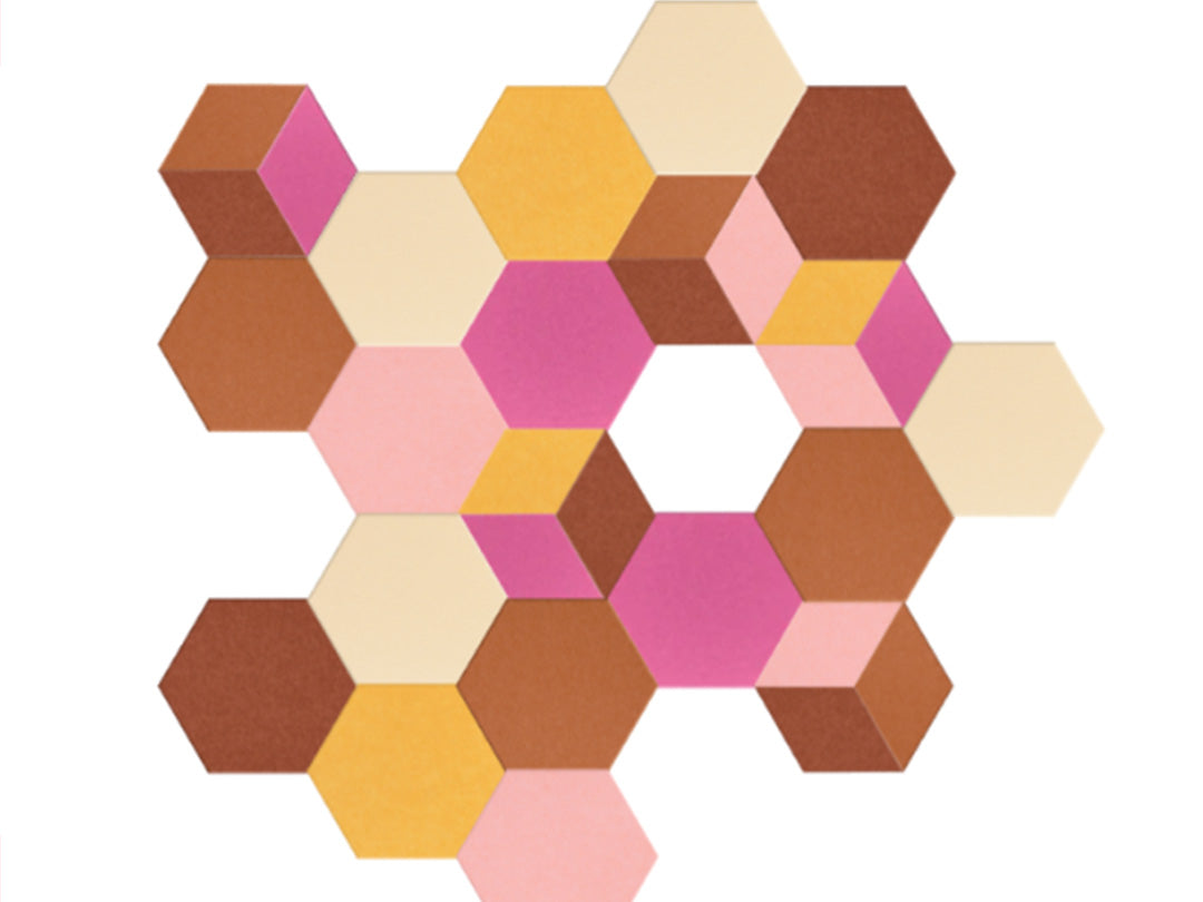 Hexagonal foam tiles in various colors on a white background