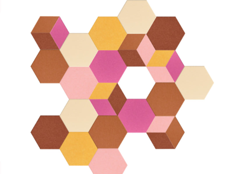 Hexagonal foam tiles in various colors on a white background