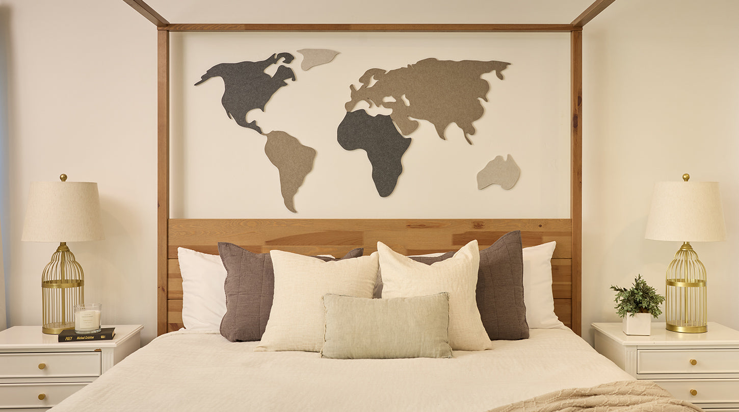 World map above bed on wall