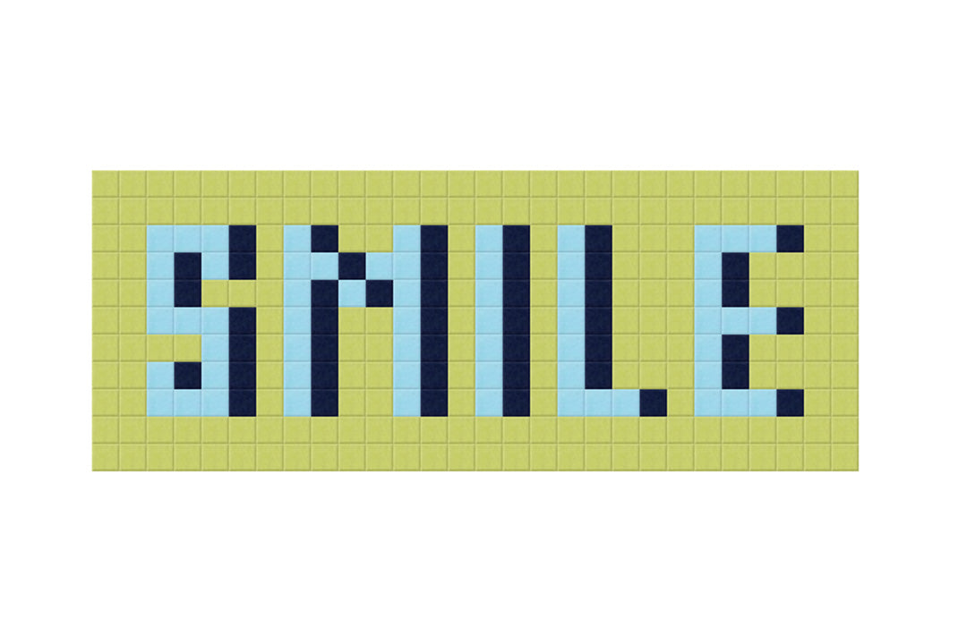 Multicolor smile sign Felt Right design made from sound-dampening acoustic felt panels