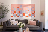 Horizontal wall art with grid of pink, purple, orange, gray, and white sparkly tiles arranged in mosaic pattern.