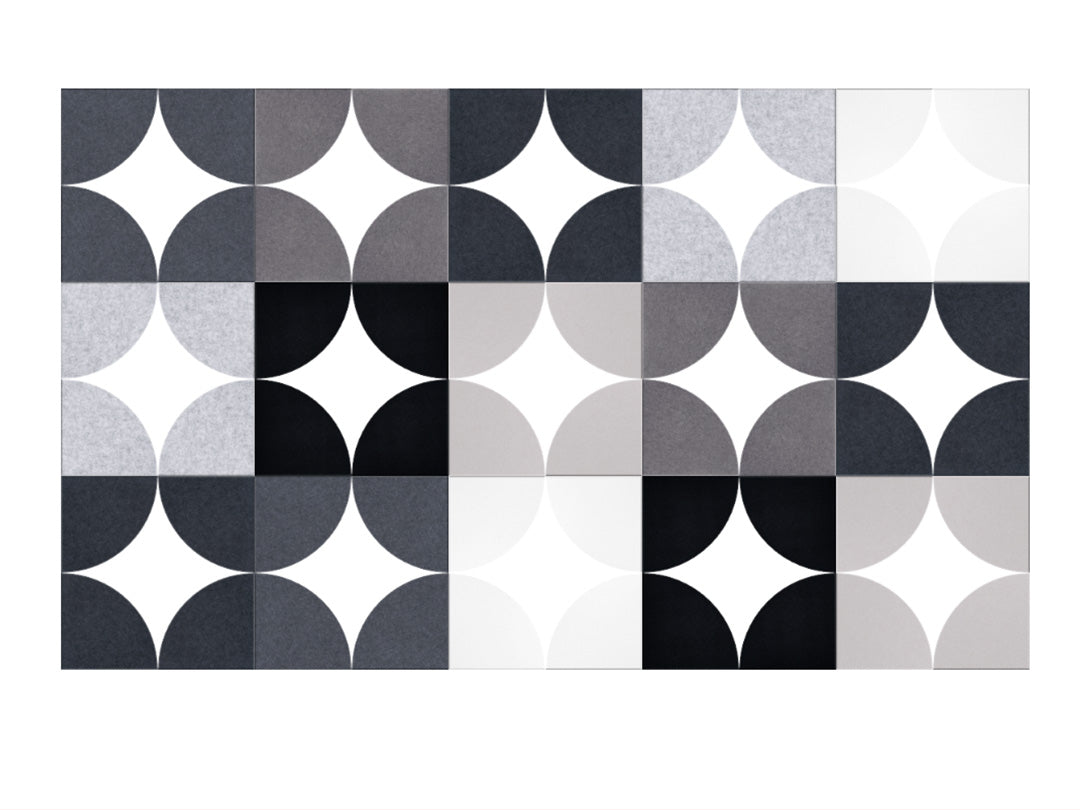Patterned tile with black, gray, and white circles on a white background