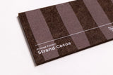 Close up of a sample for a brown felt wall panel