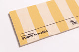Close up of a stripe yellow felt sample for wall decor