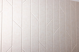 Close up engraved Latte Felt Right tile