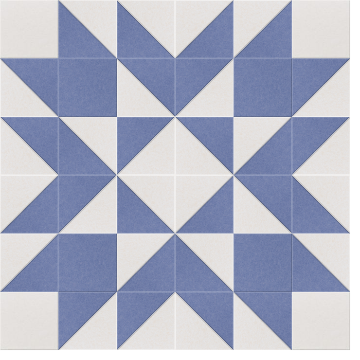 Periwinkle and cream quilted star pattern with geometric triangles arranged in repeating blocks.