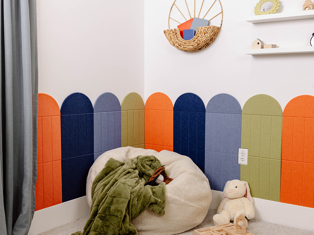 Children's room with colorful wall panels, bean bag chair, and toys.