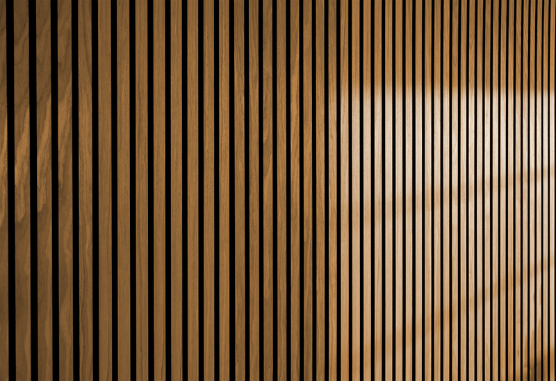 Two teak wood wall panels with evenly spaced vertical slats in light and dark brown tones.