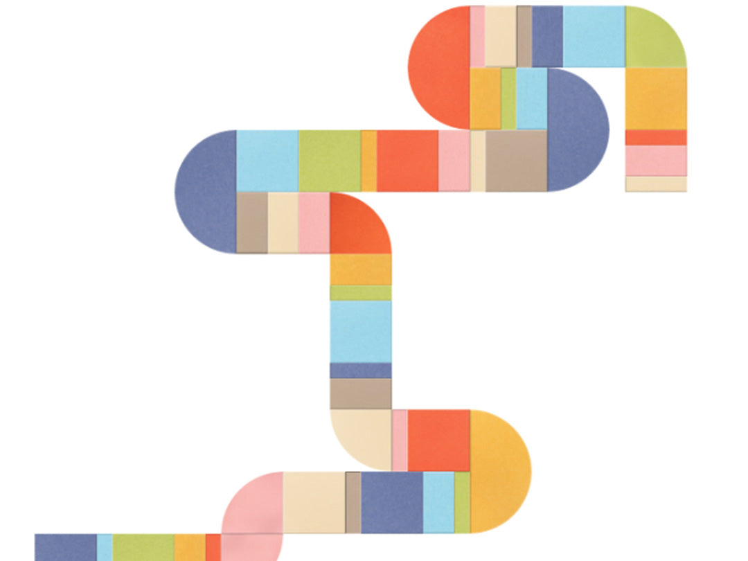 Colorful snake-shaped object with a patchwork pattern on a white background