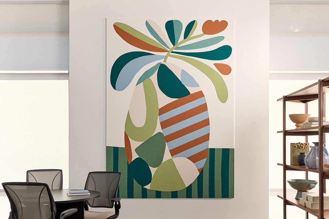 Large wall mural on white wall made out of acoustic felt that is in the shape of a vase