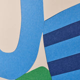 Abstract geometric acoustic felt cutout design with layered shapes in light blue, dark blue, navy, green, and warm beige.