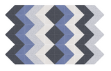 Geometric pattern with dark gray, blue, light gray, and cream colored triangles and diamonds arranged in repeating chevron de