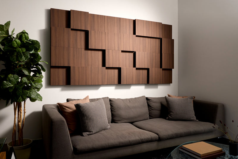 Small walnut wood grain 3D boxes in a composition on the wall of a office