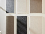 Six fabric swatches in shades of gray, cream, and brown arranged in two rows.