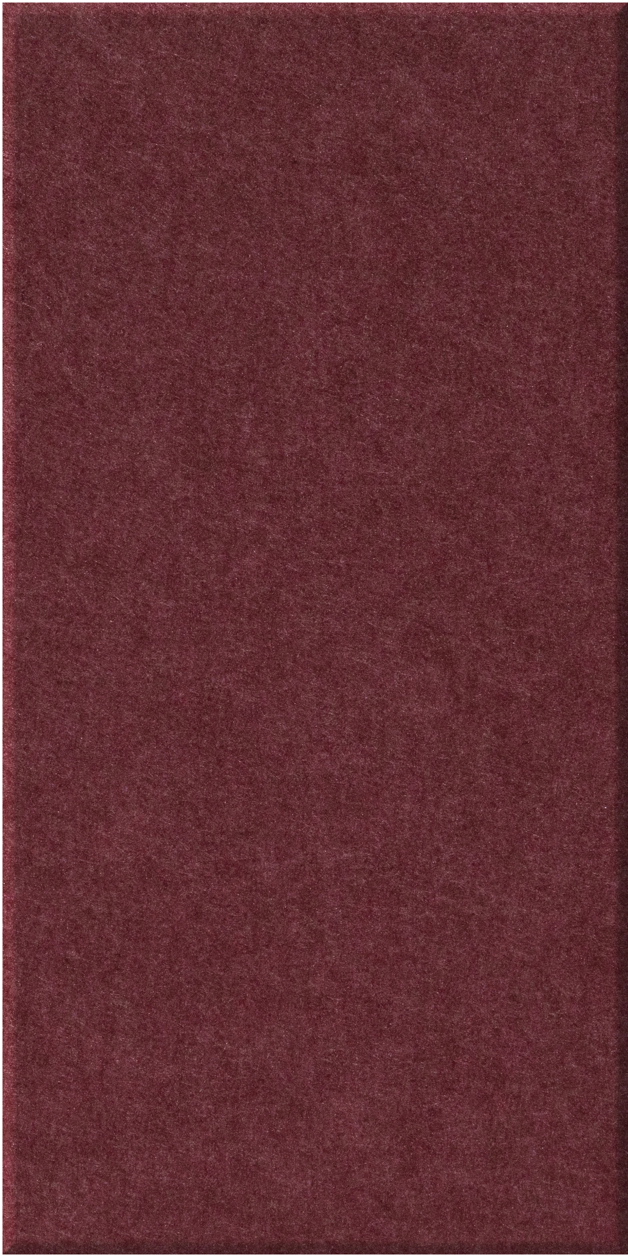 Deep burgundy tile with a matte, speckled finish.