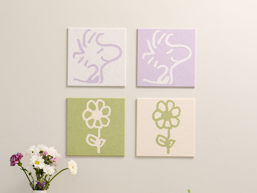 4 pastel panels with Woodstock illustrations on the wall.