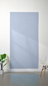 Light blue felt sheet with engraved geometric arch and vertical line pattern.