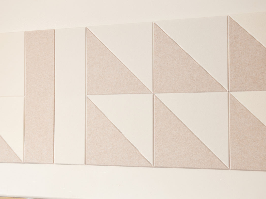 A Felt Right wall art design in shades of cream felt tiles on a wall 