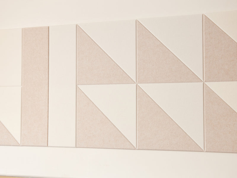 A Felt Right wall art design in shades of cream felt tiles on a wall 