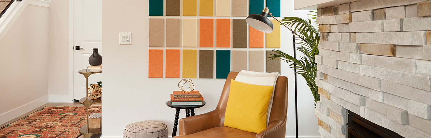 autumn mosaic felt right design in living room on wall above armchair.