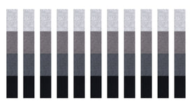 A Felt Right wall art design in shades of grey creating vertical columns in a grey ombre along a wall.