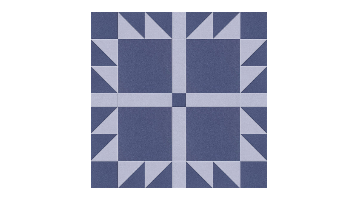 Felt Right Bears Paw quilt design wall in grey and blue displayed in a bedroom or craft room