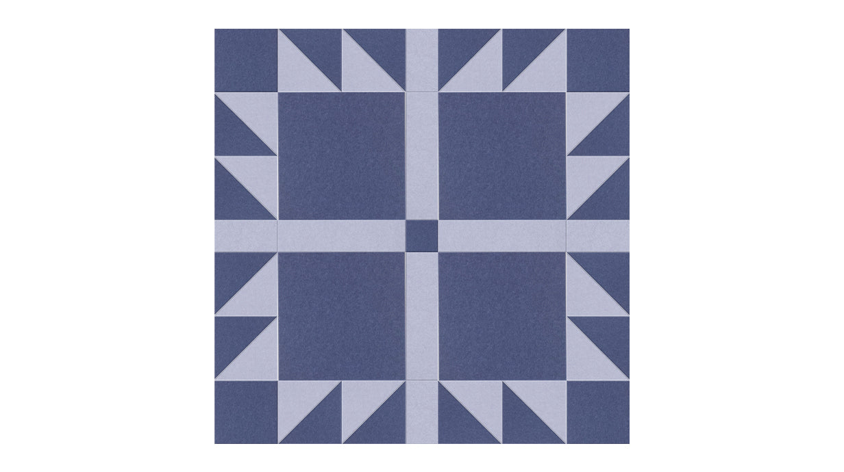Felt Right Bears Paw quilt design wall in grey and blue displayed in a bedroom or craft room